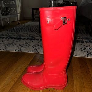 Red tall Hunter rain boots